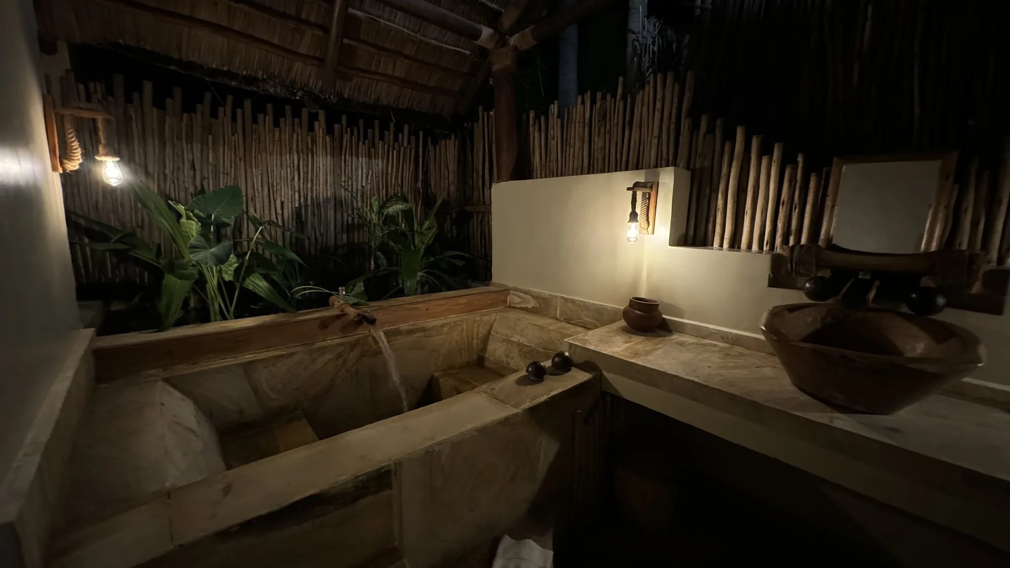 Outdoor bathroom of the Poolside Villa open to the garden